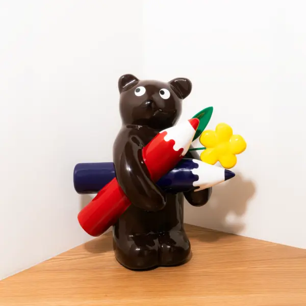 Brown Bear with Pencil Sculpture