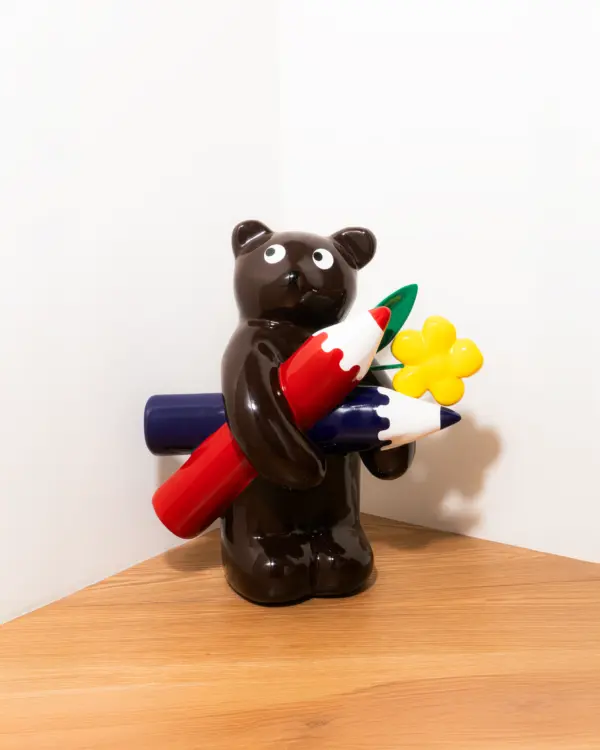 Brown Bear with Pencil Sculpture